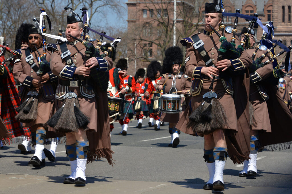 Toronto, Canada - April 27, 2013: Marching band in one of the biggest military parades in Toronto Canada, marks the 200th Anniversary of the Battle of York on April 27, 2013.